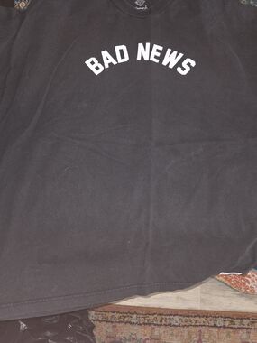 Diamond Black Short Sleeve Tee with White "BAD NEWS" Chest Print
